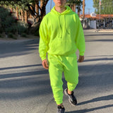 Chándal de moda para hombre de estilo verde neón Sólido 2 piezas Sudadera con capucha de manga larga + Pantalones de chándal sueltos Traje deportivo casual Hombres 2019 El más nuevo OMSJ